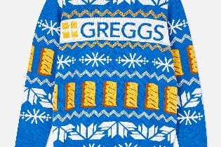 “Immediately get into the festive spirit by slipping on this knitted Christmas jumper, complete with Sausage Roll detailing.”