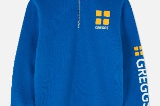 “Snuggle up this winter in the Greggs Blue Quarter Zip, decked out with the iconic Greggs logo along the left sleeve.”
