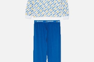 “Get cosy in this two-piece branded pyjama set. Featuring an oversized shirt and cuffed bottoms, the set is perfect for cold winter evenings (or days!) at home.”