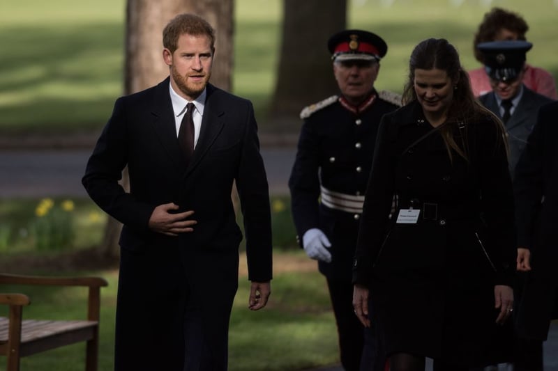 Prince Harry, Duke of Sussex, (L) arrives to dedicate the Sousse and Bardo Memorial in Cannon Hill Park, Birmingham, central         (Photo - read OLI SCARFF/AFP via Getty Images)