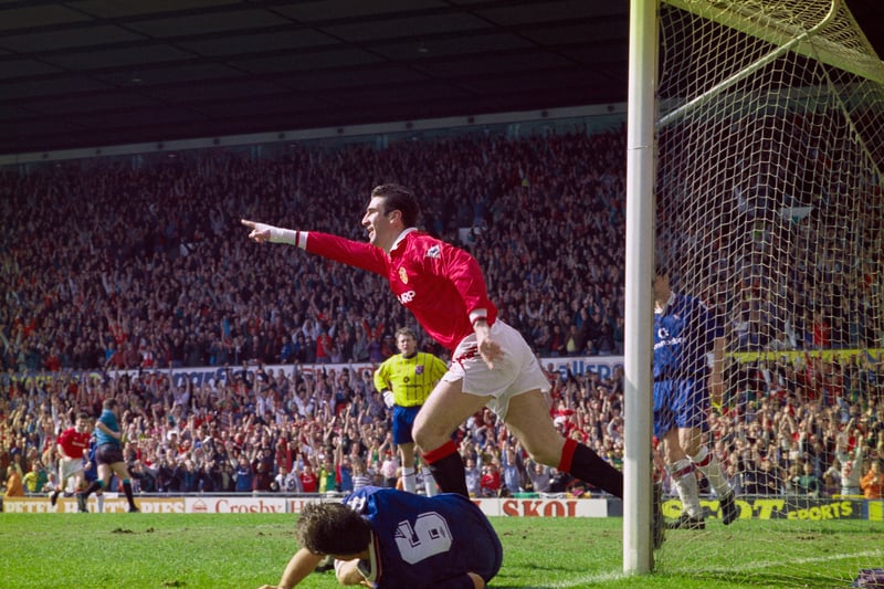 This was how Old Trafford looked in April 1993, with fans celebrating a goal by iconic French midfielder Eric Cantona against Chelsea. Photo: Stevie Morton/Allsport/Getty Images