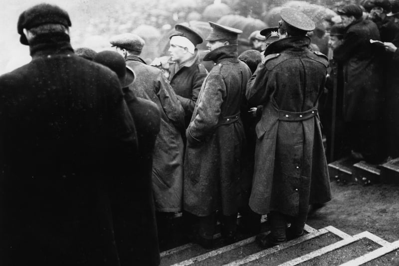 Soldiers wounded in World War One at Old Trafford in April 1915 to watch the FA Cup Final between Sheffield United and Chelsea. Photo: Topical Press Agency/Getty Images