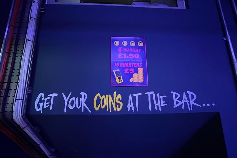 Instead of  putting your pound coins in the slots, you trade cash for quarters at the bar.
