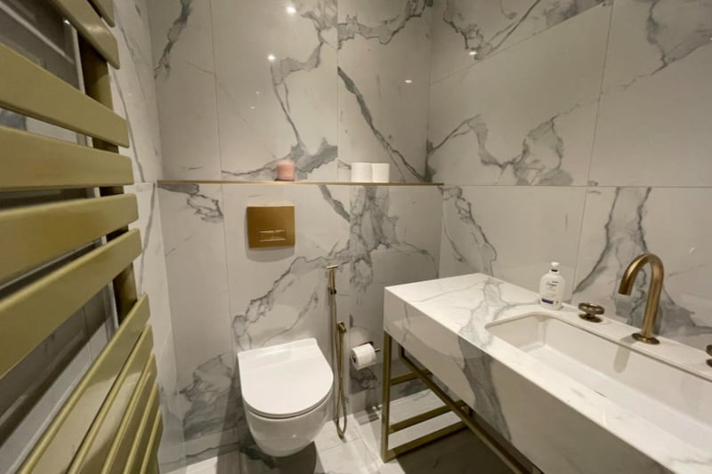 The property has three luxurious bathrooms, each feeling like stepping into a hotel.