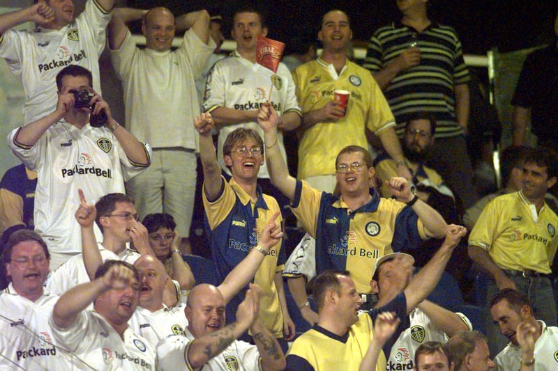 The travelling fans show their support for the mighty Whites during Leeds United’s UEFA cup tie against Marítimo in September 1998.
