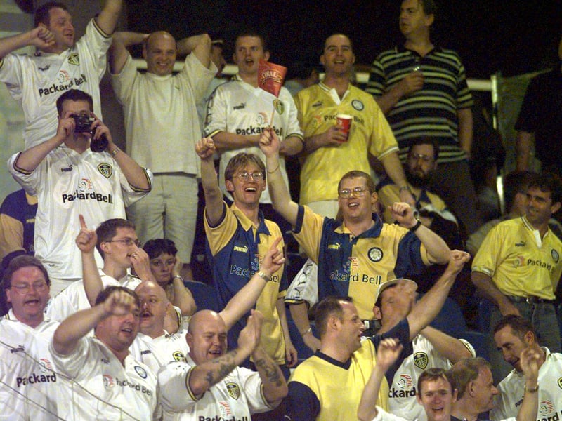 The travelling fans show their support for the mighty Whites during Leeds United’s UEFA cup tie against Marítimo in September 1998.