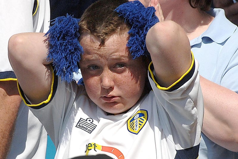 A young fan looks dejected after United’s catastrophic Championship game against Ipswich at Elland Road, May 2007.