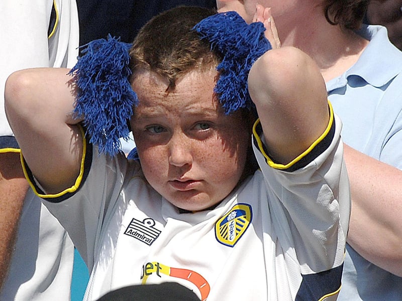 A young fan looks dejected after United’s catastrophic Championship game against Ipswich at Elland Road, May 2007.