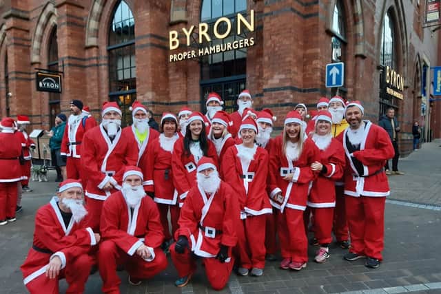 Santas gather in Leeds city centre 