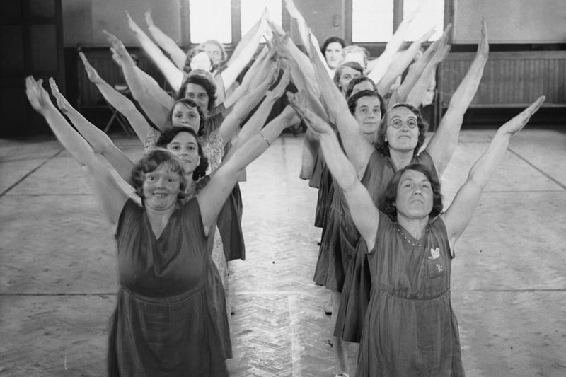 A group of women from Birkenhead attend a keep-fit class in Wallasey, run for office girls and wives - 1936. Image: Nick Yapp/Fox Photos/Getty Images