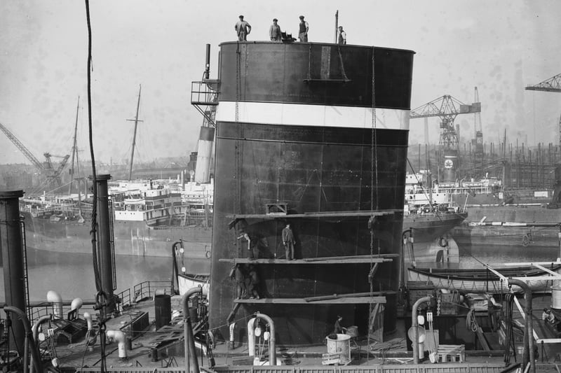 A liner nears completion at the Cammell Laird shipyard in Birkenhead, 1936.  Image: Nick Yapp/Fox Photos/Getty Images