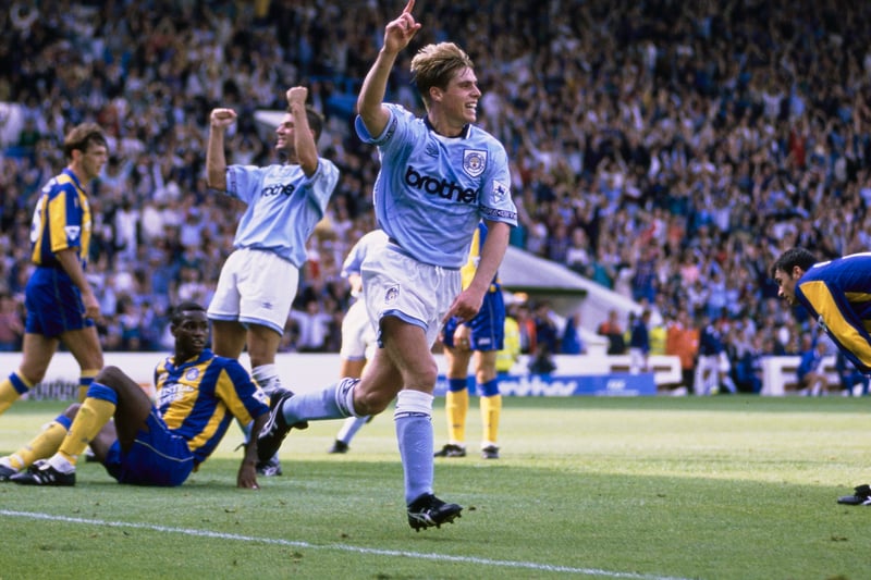 Garry Flitcroft celebrating after scoring at Maine Road against Leeds United in 1993. Photo: Steve Munday/Allsport/Getty Images/Hulton Archive