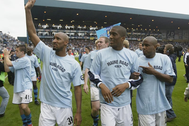 Nicolas Anelka, Sylvain Distin and David Sommeil thank the crowd while wearing special T-shirts to bid farewell to Maine Road after the final game played there. Photo: Alex Livesey/Getty Images