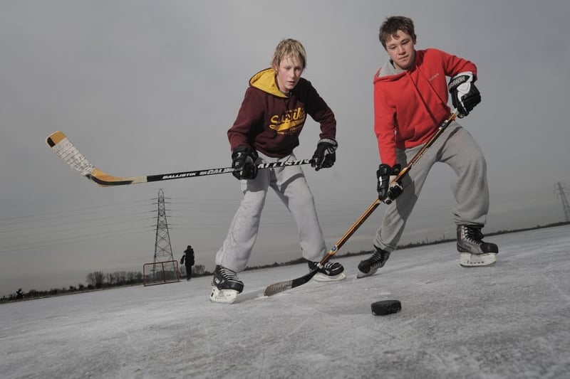 Jack Wicks then (15) and Daniel Swan then (15) shape up their ice hockey skills on the Whittlesey Washes .