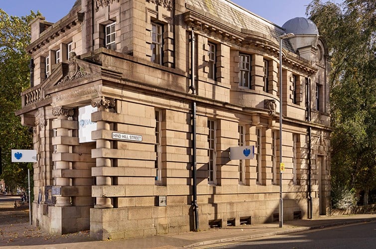 This grade II early 20th-century bank was designed by the Mould brothers in the Edwardian Baroque style. Built in 1909, this 103-year-old bank is still in service today. (Photo: Historic England)
