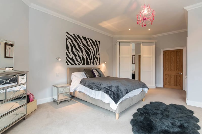 The first floor features four additional double bedrooms 