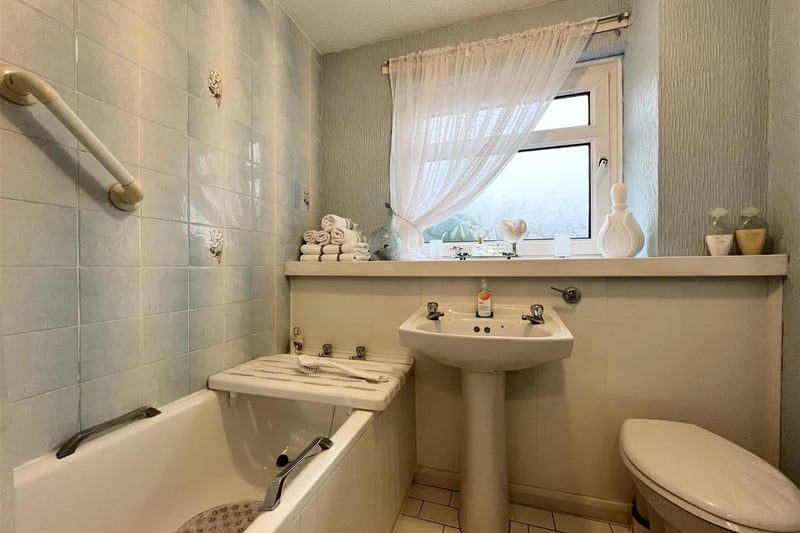 A three-piece bathroom on the upper floor of the property