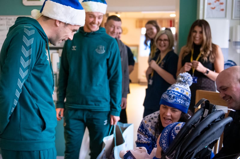 Seamus Coleman and Tom Davies of Everton make a Christmas 2022 visit to Zoe’s Place, Liverpool. (Image: Everton TV)