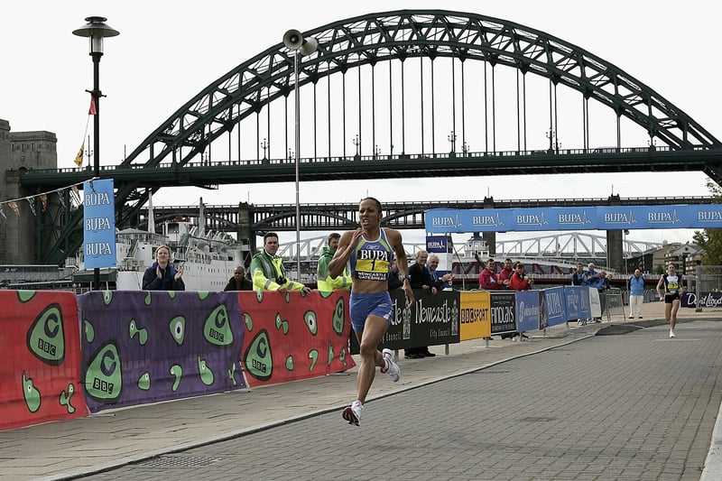 Kelly Holmes on her way to the finishing line with the Tyne Bridge in the background as she wins the Bupa Great North Run Mile at The Quayside  in 2004.