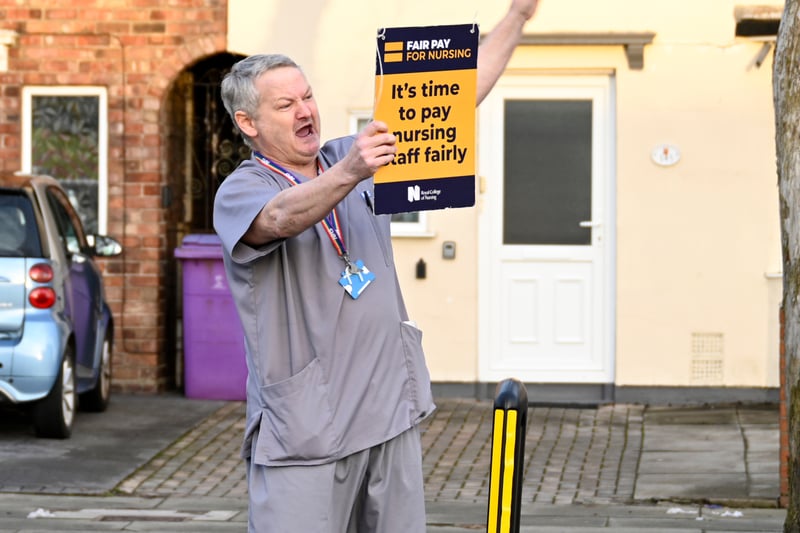 A nurse holding a sign on the picket line outside Aintree University Hospital on December 20, 2022. Image: Annabel Lee-Ellis/Getty Images