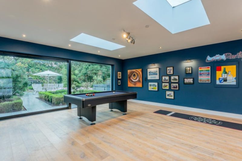 A large games rooms has views of the stunning garden. 