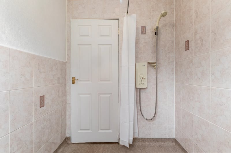 The wet room/shower room inside the property 
