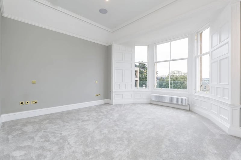 The bedrooms are complimented by clean and wide-reaching bay windows