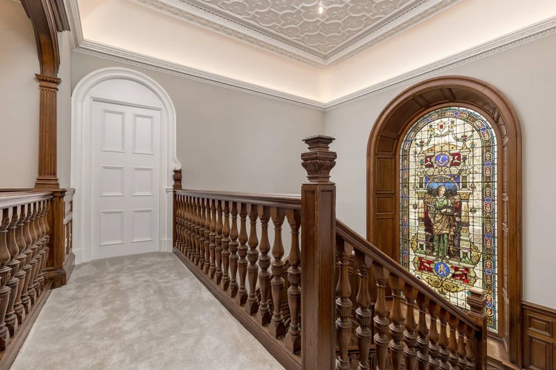 On the landing you can enjoy the timeless stained glass window 