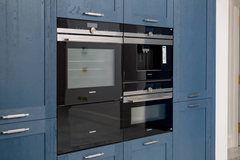 The kitchen is immaculately designed with efficient storage space