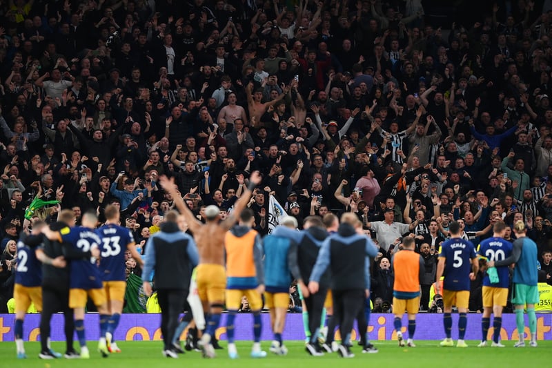 Players and fans celebrate a 2-1 win away at Spurs on October 23.