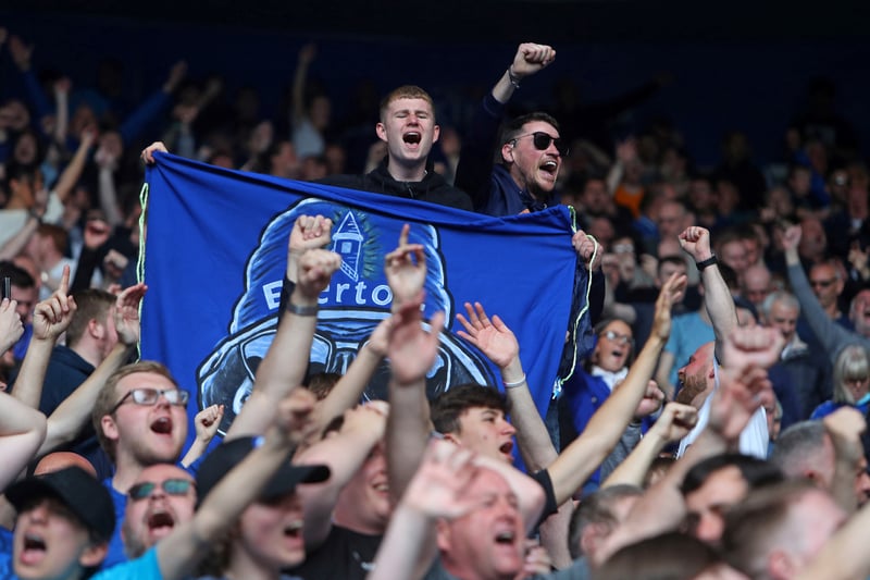 Supporters celebrate a win at Leicester last season during the relegation battle.