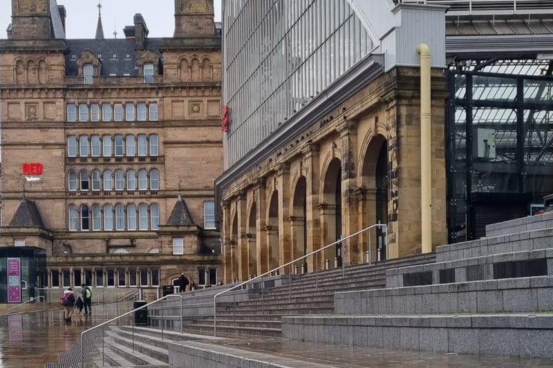 Commuters make their way up the steps at Liverpool Lime Street station.