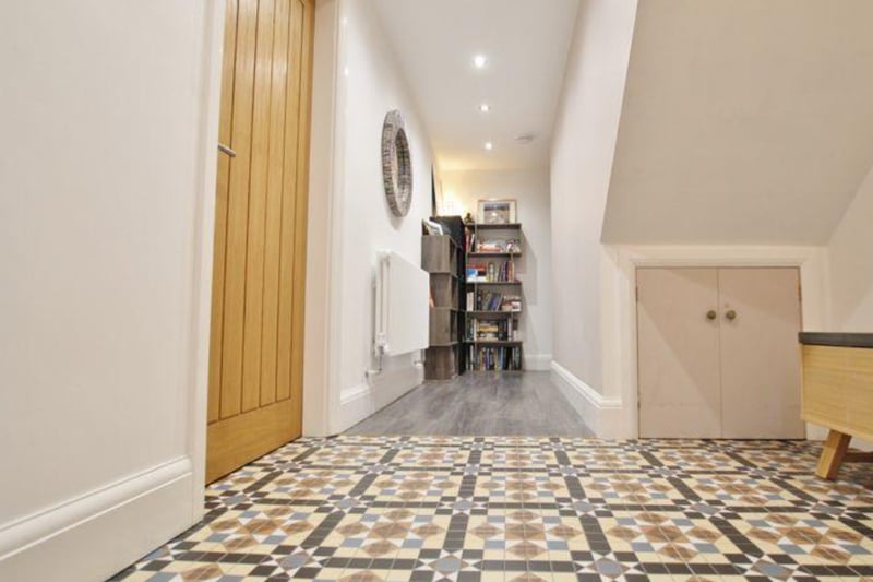 The bungalow features quirky floor tiles.