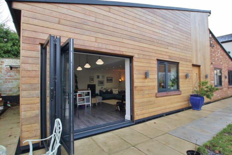 Large bi-fold doors lead straight to the open plan living area.