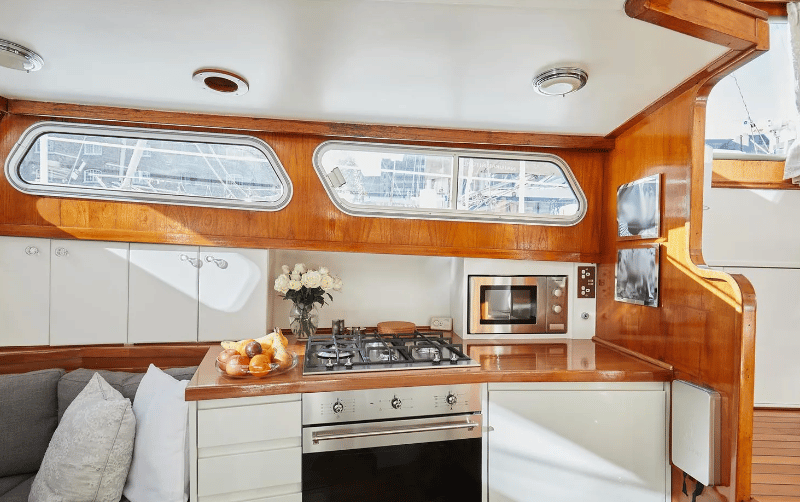 First view of the inside of the boat, showcasing the kitchen area