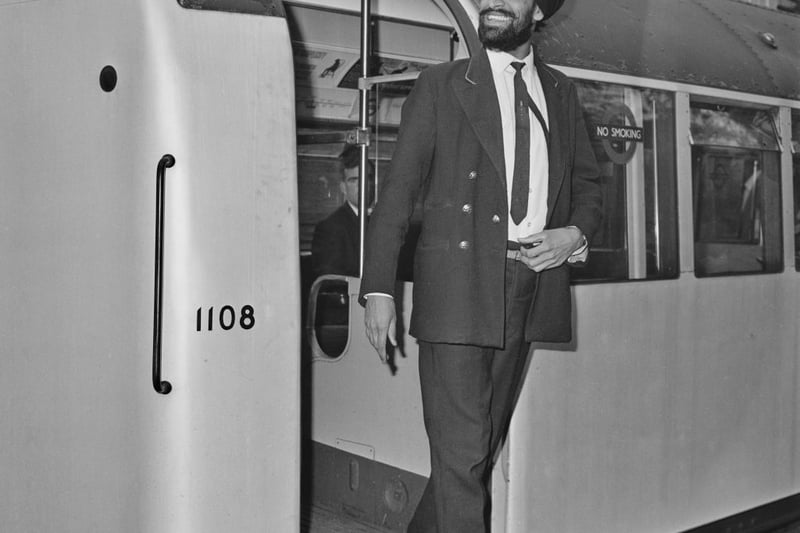 London Transport railway guard Amar Singh after being granted permission by his employers to wear a turban instead of the uniform peaked cap at work, London, UK, 4th September 1964. 