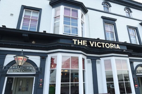 The Victoria is a large predominant building located in a prime location on Southport seafront. Inside the pub is open plan and spacious with a large trading area and bar. There is an equipped commercial kitchen and plenty of space for events and entertainment. There is a large feature staircase that leads to an upper-level function/meeting room which is ideal for private events.  The pub has a large enclosed outside area, some covered, for drinking and dining with great views.  The private accommodation consists of three bedrooms, kitchen, office, lounge, bathroom, and toilet. According to FindMyPub, the annual rent is £10,000 with an ingoing cost of £12,000.