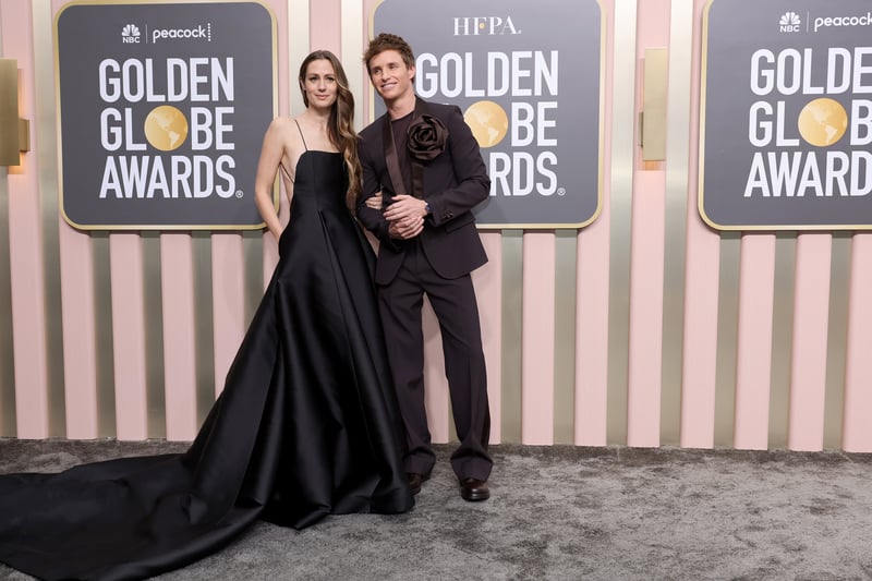 Eddie Redmayne and his wife Hannah Bagshawe both wore colour co-ordinating Valentino.