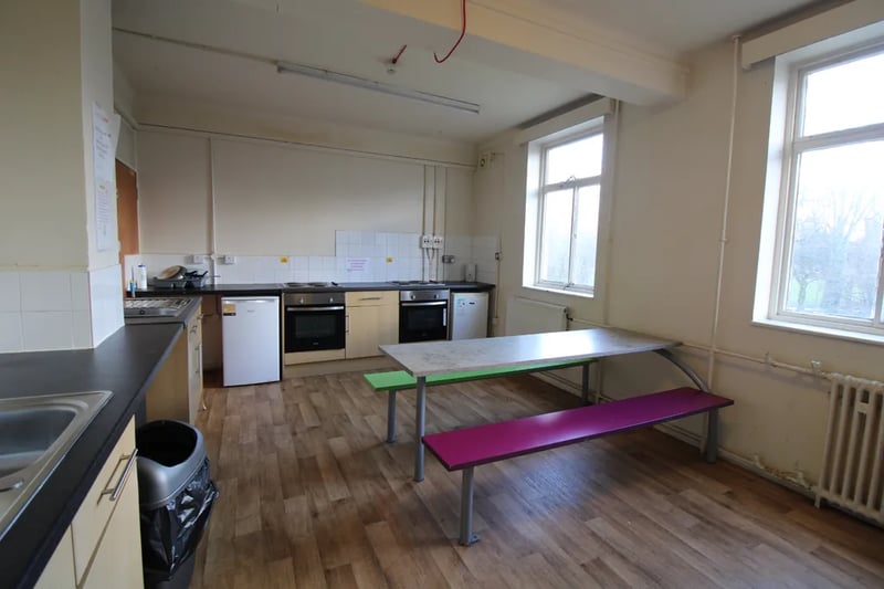 The flat shares a kitchen with other occupants in the block