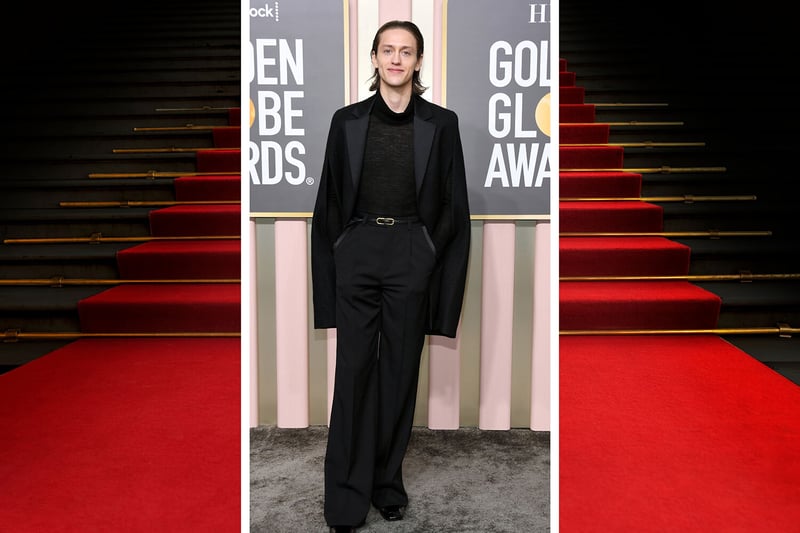 Percy Hynes White attended wearing a suit by Saint Laurent.