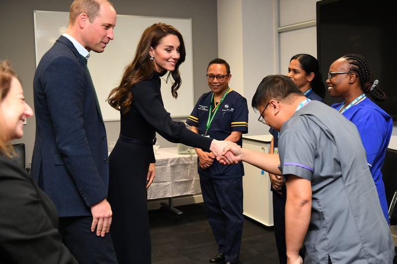  William and Kate shake hands with NHS staff at Royal Liverpool University Hospital.