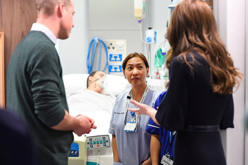 William and Kate meet health care assistant Anne O’Hara (centre) in the intensive care ward during a visit to the Royal Liverpool University Hospital 