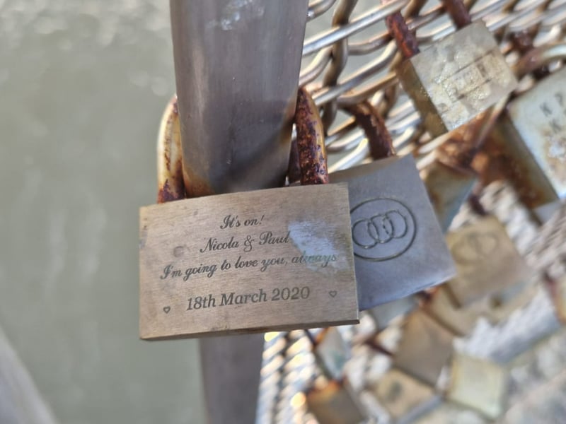 Most padlocks left on the bridge are used to declare love or make significant events such as weddings - like this one.