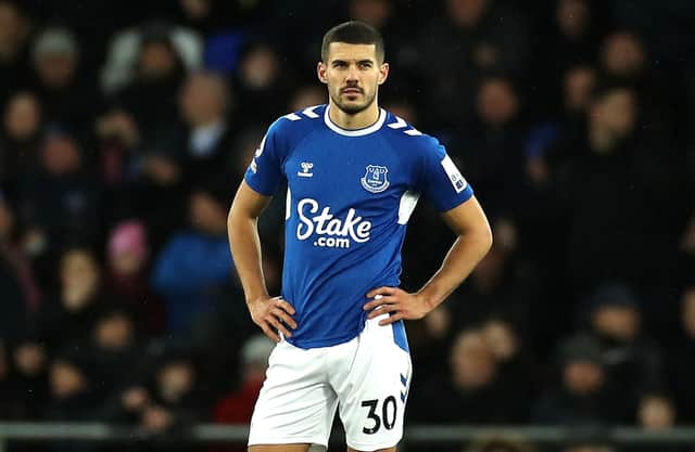 Conor Coady of Everton looks dejected after James Ward-Prowse of Southampton (not pictured) scores the team's second goal during the Premier League match between Everton FC and Southampton FC at Goodison Park on January 14, 2023 in Liverpool, England. (Photo by Lewis Storey/Getty Images)
