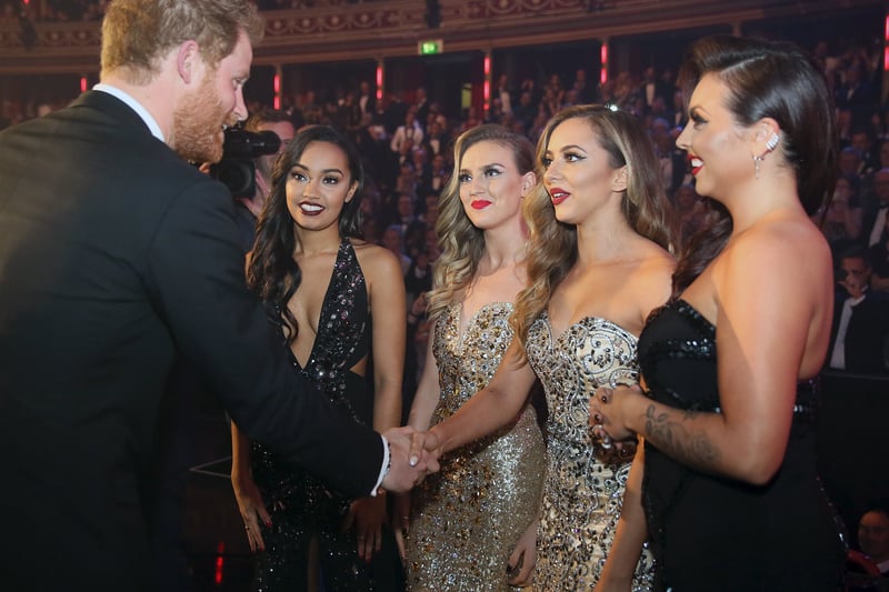 Little Mix are greeted by Prince Harry after their performance at the Royal Variety Show in 2013.