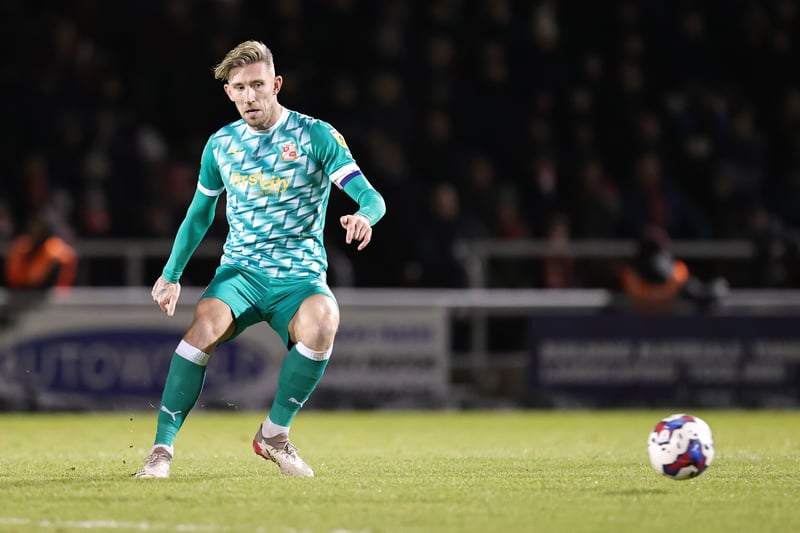 Angus MacDonald is the experienced defender that Joey Barton is looking for. 

MacDonald has captained Swindon this season and they’re looking for offers. His experience could be key. 