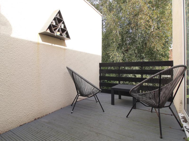 The balcony is accessed by sliding doors.