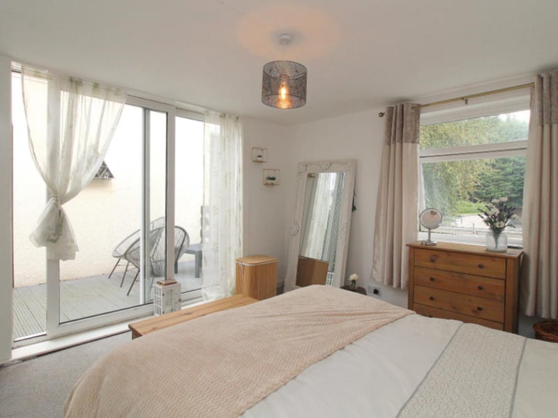 Upstairs, there are three bedrooms and the master has a balcony.