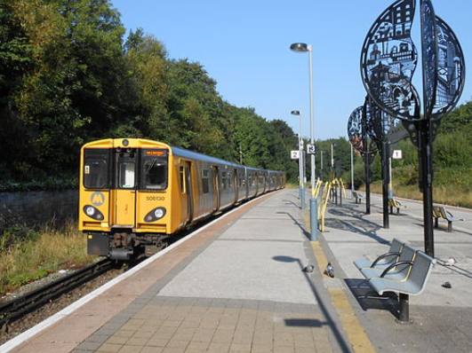 A Merseyrail train leaves Birkenhead Park, 2013.