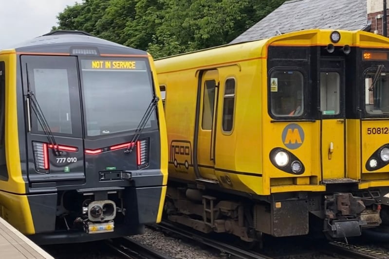 The new 777 train, next to the current 508 - mixed traffic testing at Hightown, 2021.
